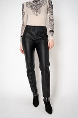 D. EXTERIOR PULL-ON STYLE FAUX LEATHER TROUSERS