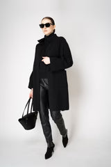 D. EXTERIOR PULL-ON STYLE FAUX LEATHER TROUSERS
