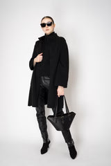 D. EXTERIOR PULL-ON STYLE FAUX LEATHER TROUSERS