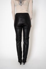D. EXTERIOR PULL-ON STYLE FAUX LEATHER TROUSERS