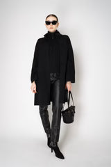 D. EXTERIOR WOOL CASHMERE KNIT COAT
