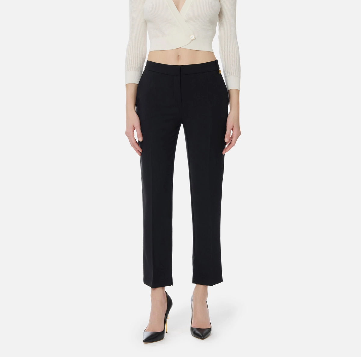 Trousers in lightweight crêpe fabric with logo charm