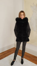 Coat with unzippable sleeves and hood