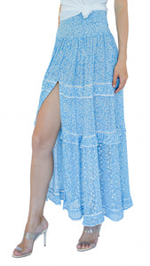 Long skirt with front buttons and slit in blue with floral print