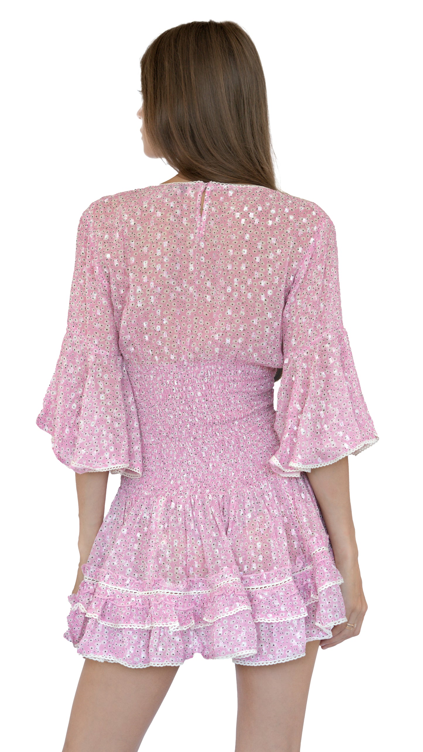 Sunday St Tropez Short pink dress smocked at the waist with ruffled sleeves. Floral print and embroidered finishes.