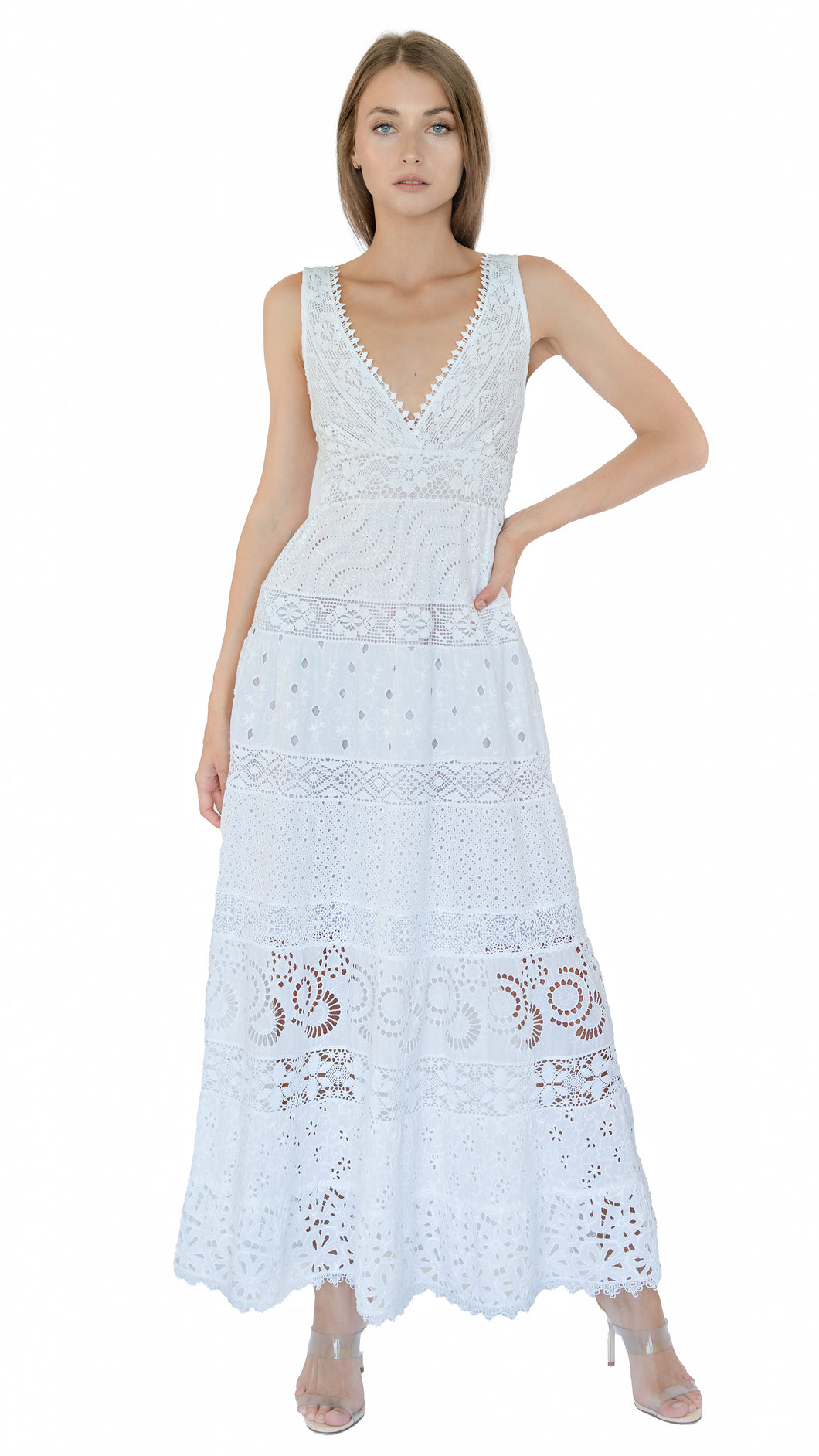 Temptation Positano Long maxi dress with crochet lace trim, a scallop plunge v-neckline with a smocked empire waist and pom pom trim in white
